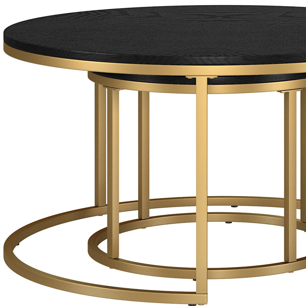 Set of Two 35-Inch Black and Gold Steel Round Nested Coffee Tables