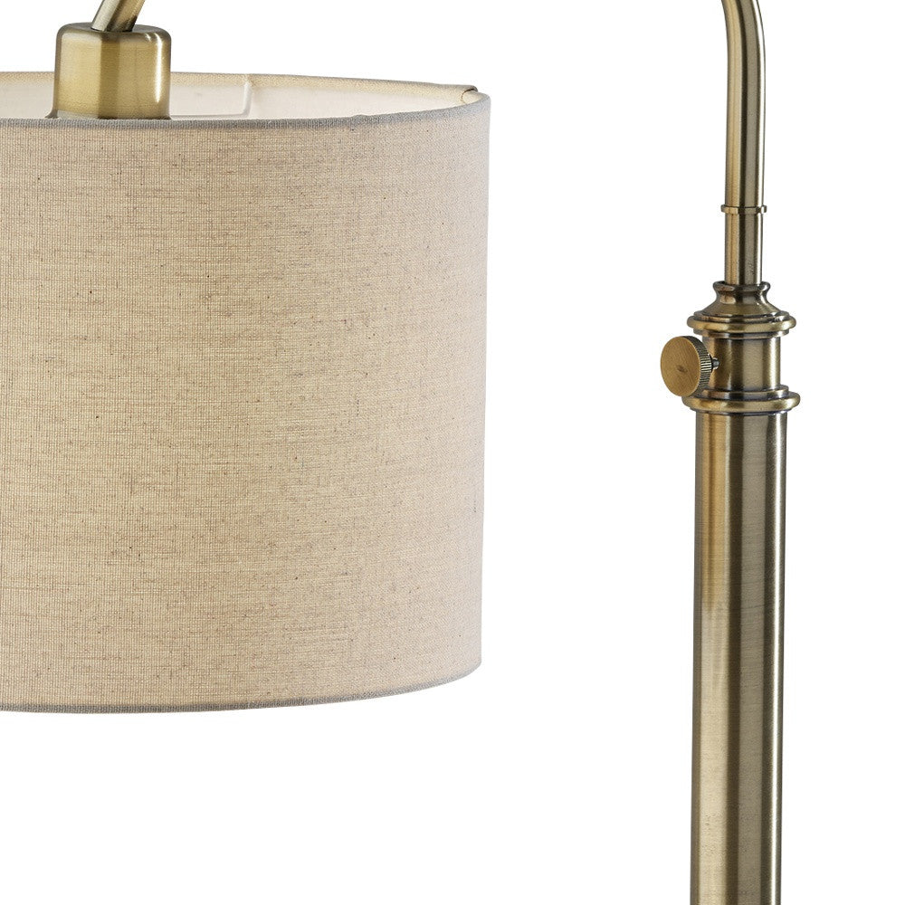 32" Antiqued Brass Metal Adjustable Arched Lamp With Beige Drum Shade