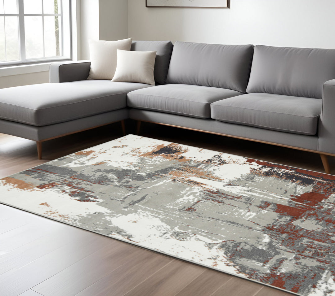 10' X 14' Ivory Gray and Rust Abstract Power Loom Area Rug