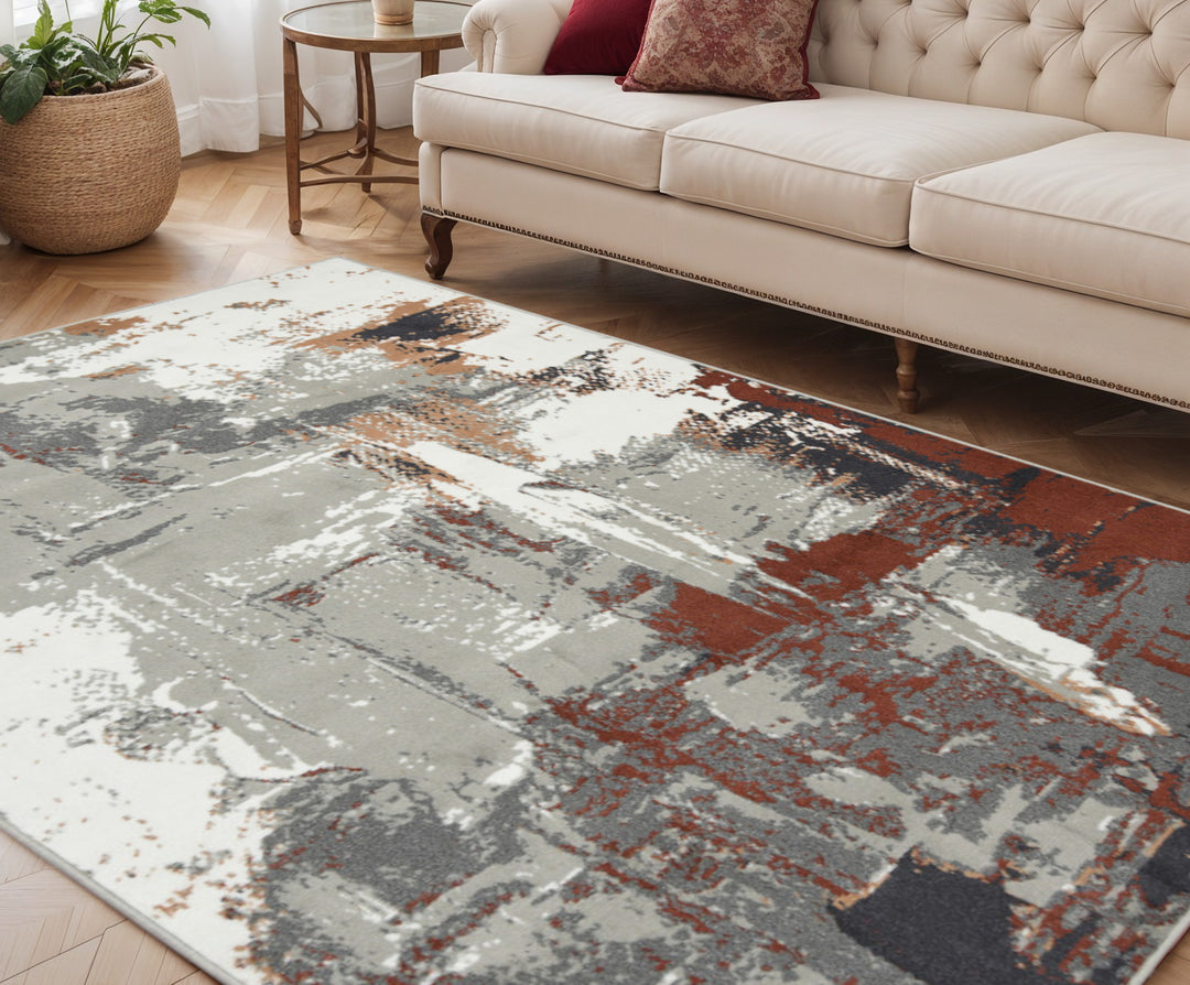 10' X 14' Ivory Gray and Rust Abstract Power Loom Area Rug