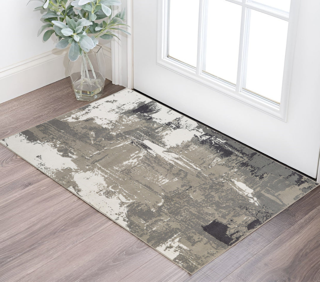 10' X 14' Ivory Black and Gray Abstract Power Loom Area Rug