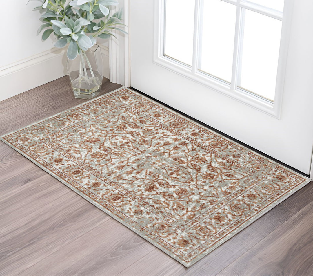 10' X 14' Rust and Gray Floral Power Loom Area Rug