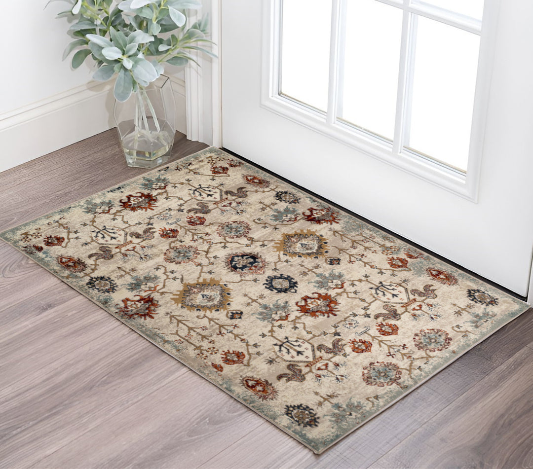 2' X 3' Beige Rust and Navy Oriental Power Loom Area Rug