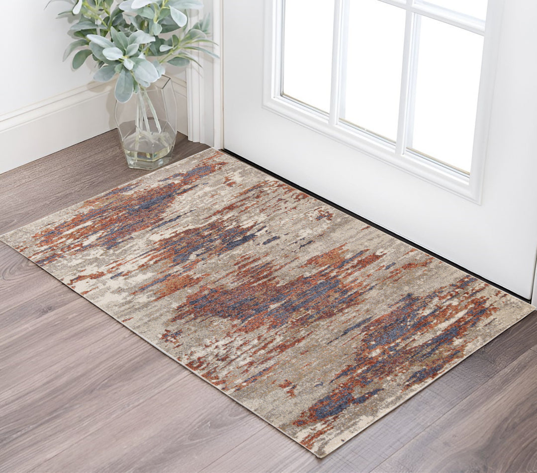 2' X 3' Beige Rust and Blue Abstract Power Loom Area Rug