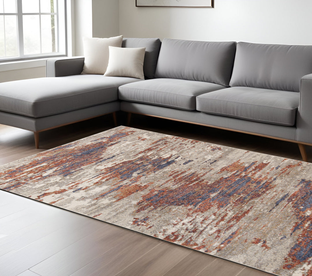 2' X 3' Beige Rust and Blue Abstract Power Loom Area Rug