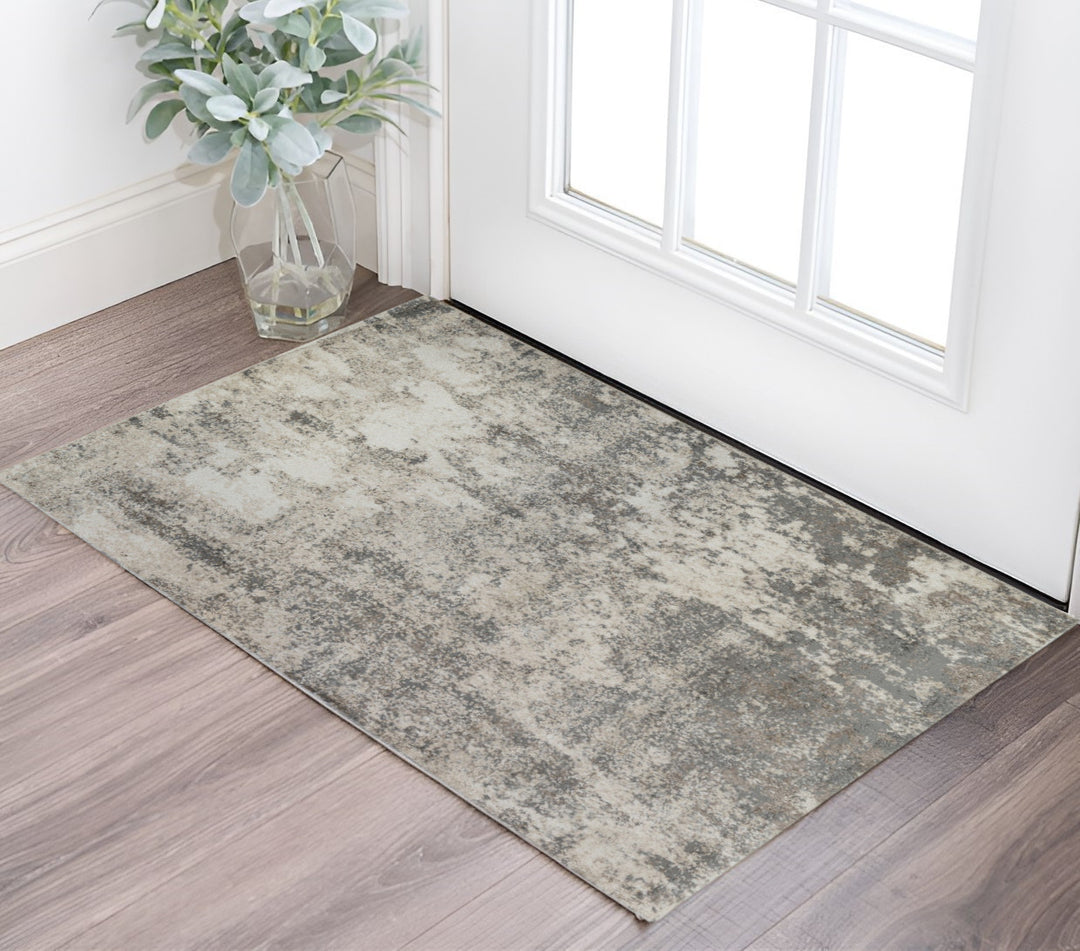 2' X 3' Beige Ivory and Gray Abstract Power Loom Area Rug