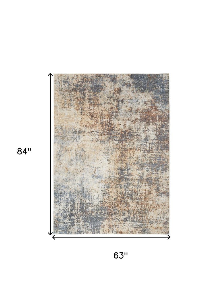 5' X 7' Blue and Ivory Abstract Power Loom Washable Area Rug