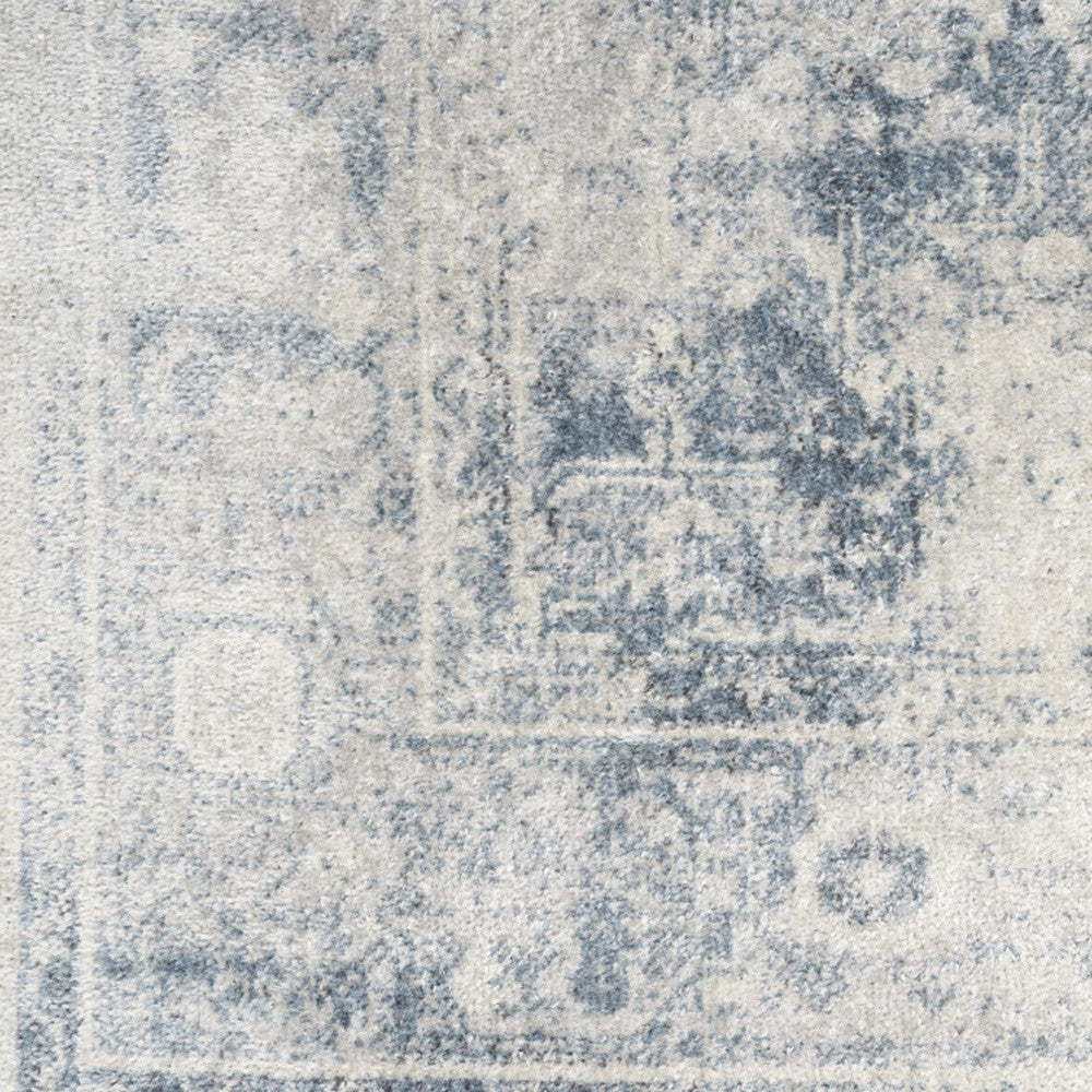 8' X 10' Blue and Ivory Abstract Power Loom Washable Area Rug