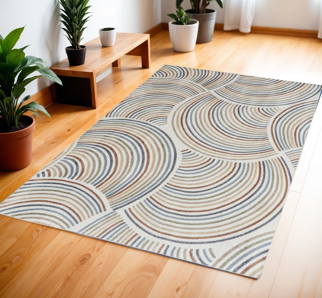 4' X 6' Blue and Ivory Geometric Power Loom Washable Area Rug