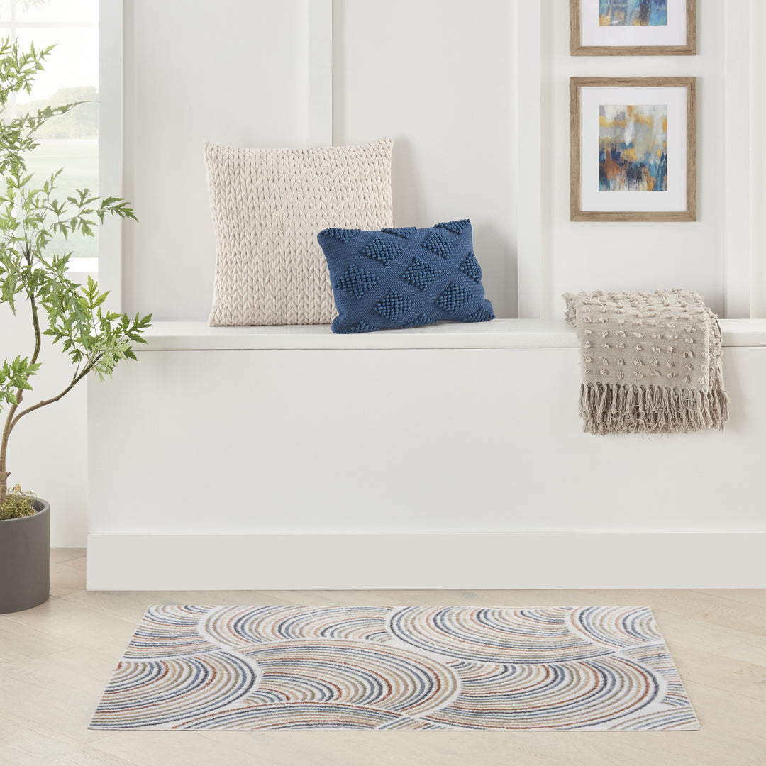 5' X 7' Blue and Ivory Geometric Power Loom Washable Area Rug