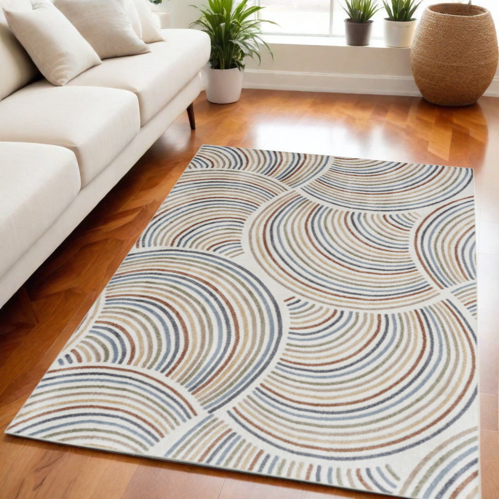 5' X 7' Blue and Ivory Geometric Power Loom Washable Area Rug