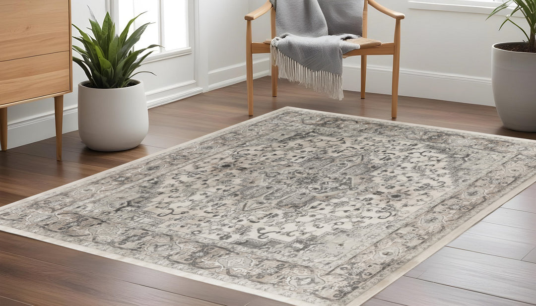 10' Gray and Ivory Square Medallion Power Loom Distressed Area Rug