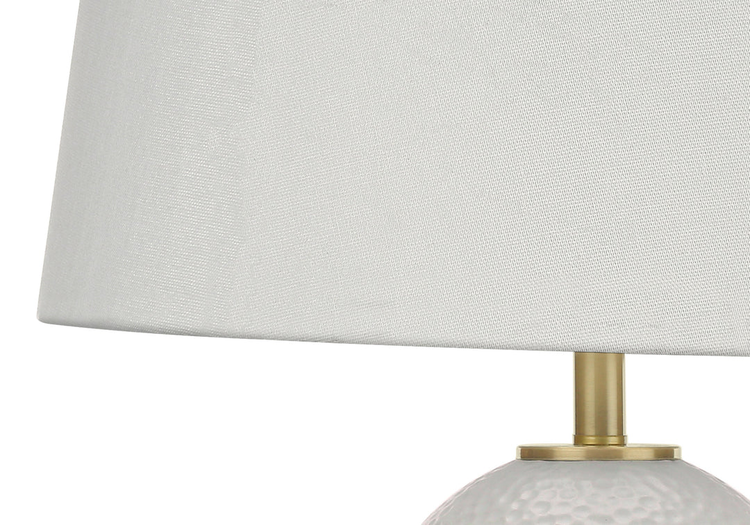 26" Gold and White Ceramic Urn Table Lamp With Cream Empire Shade