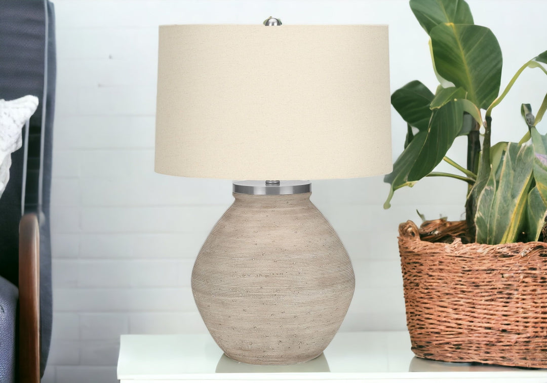 25" Cream Concrete Round Table Lamp With Beige Drum Shade