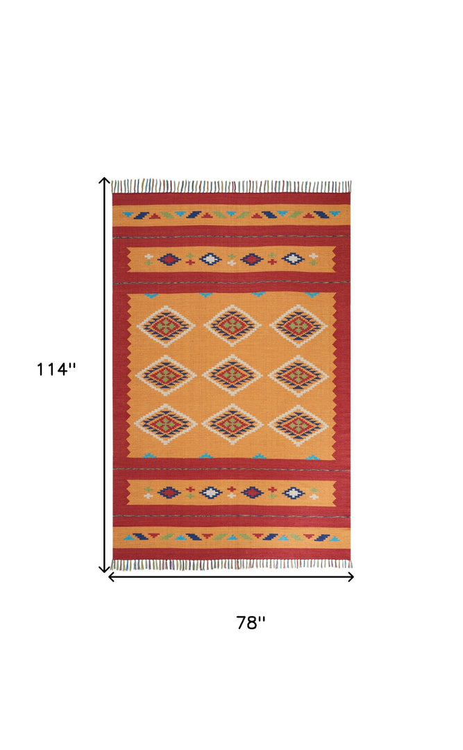 7' X 10' Orange and Red Southwestern Handmade Area Rug With Fringe