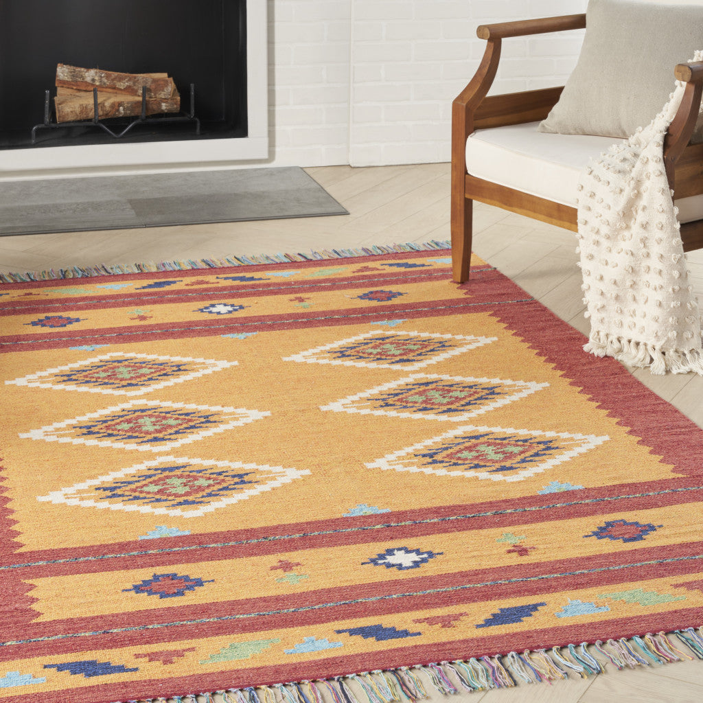 7' X 10' Orange and Red Southwestern Handmade Area Rug With Fringe