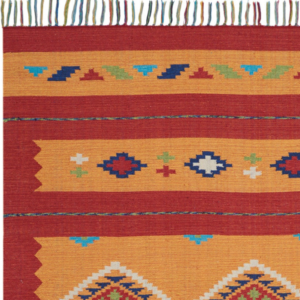 7' X 10' Orange and Red Southwestern Handmade Area Rug With Fringe