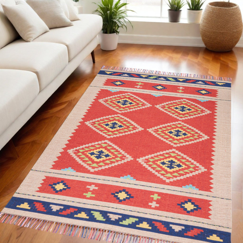 5' X 7' Beige and Red Southwestern Handmade Area Rug With Fringe