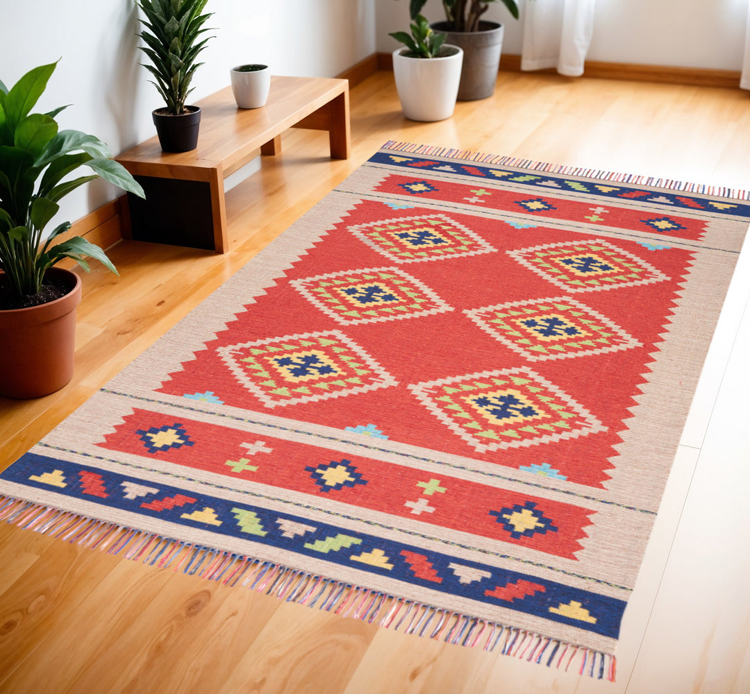 4' X 6' Beige and Red Southwestern Handmade Area Rug With Fringe