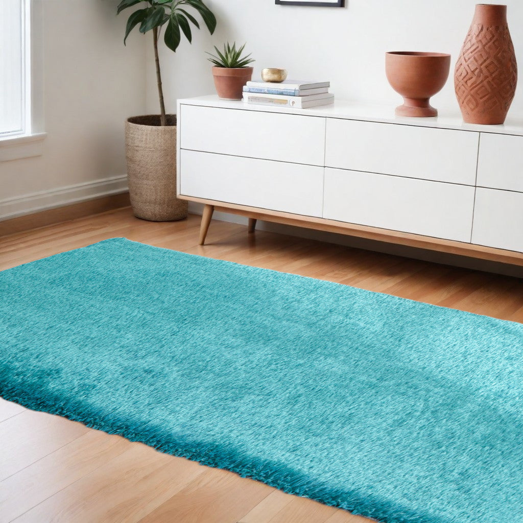 8' X 11' Turquoise Shag Hand Tufted Area Rug