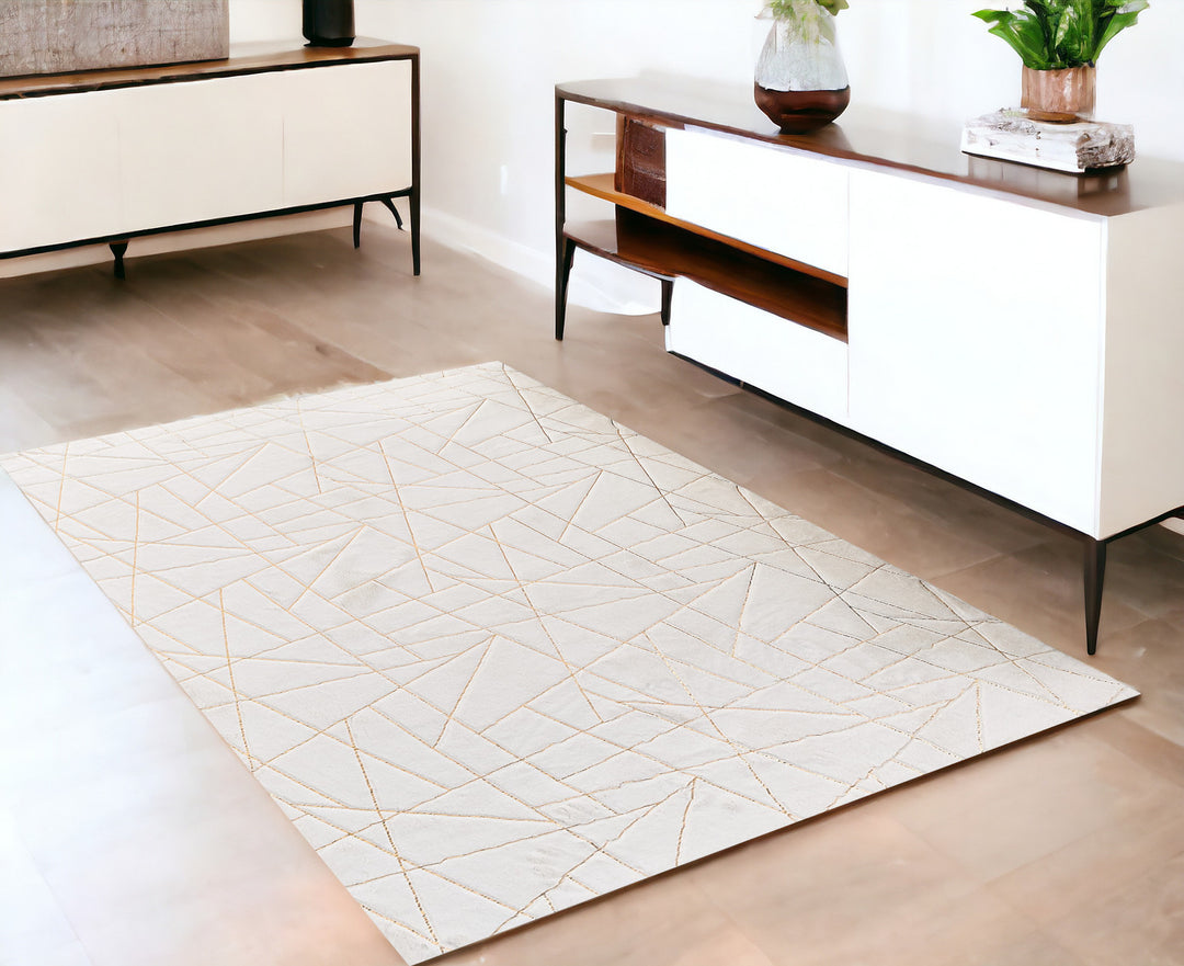 6' X 9' White and Gold Faux Sheepskin Abstract Geometric Machine Tufted Washable Non Skid Area Rug