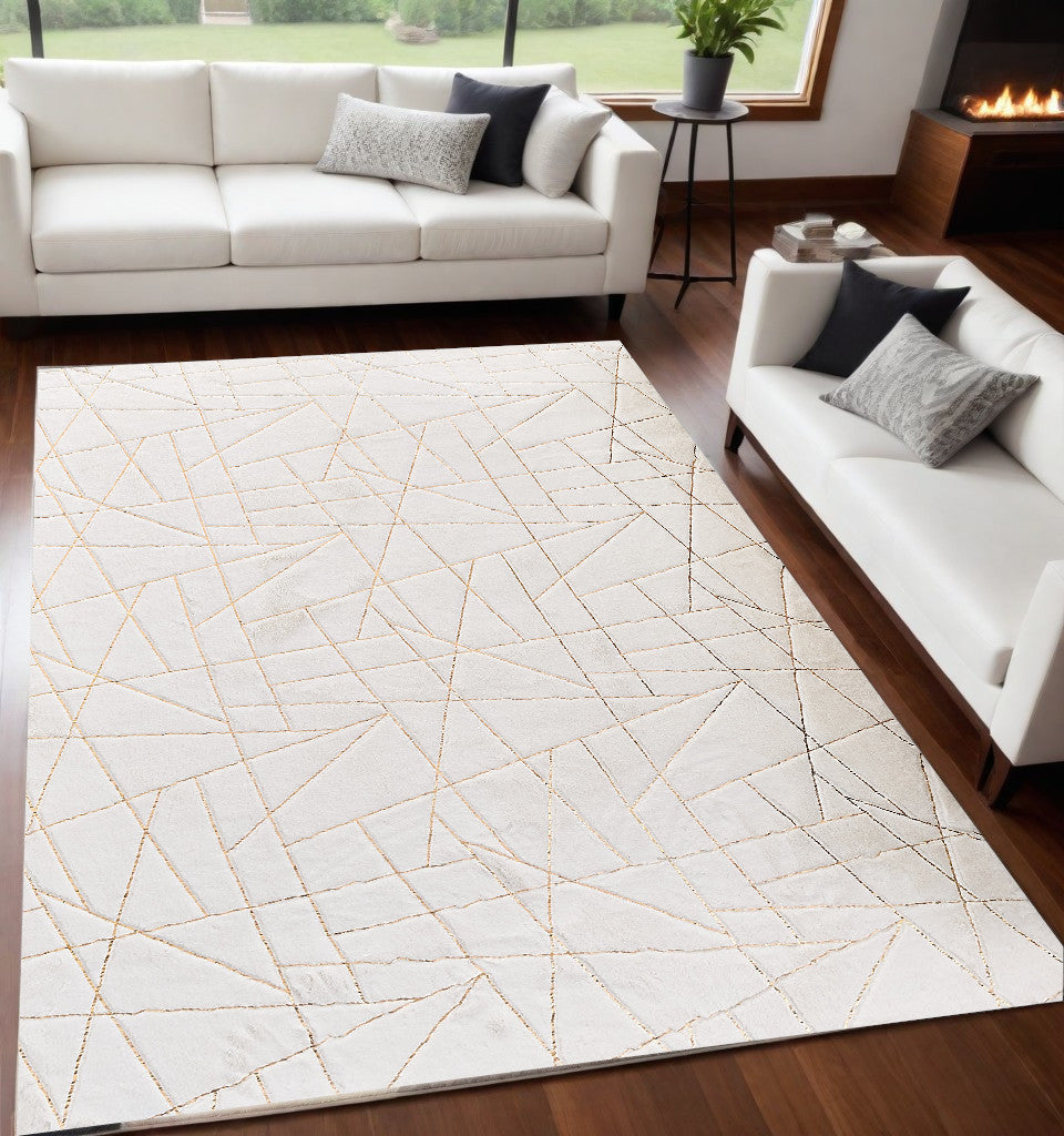 6' X 9' White and Gold Faux Sheepskin Abstract Geometric Machine Tufted Washable Non Skid Area Rug