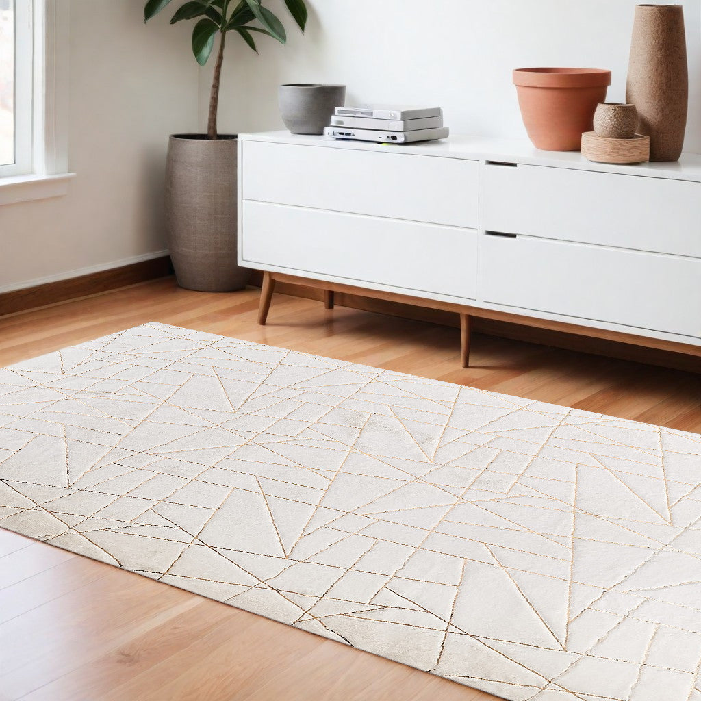 6' X 9' White and Gold Faux Sheepskin Abstract Geometric Machine Tufted Washable Non Skid Area Rug