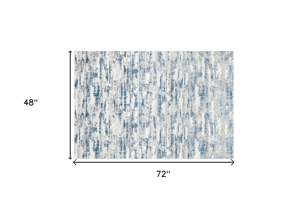 5' X 8' Blue and White Abstract Washable Non Skid Area Rug