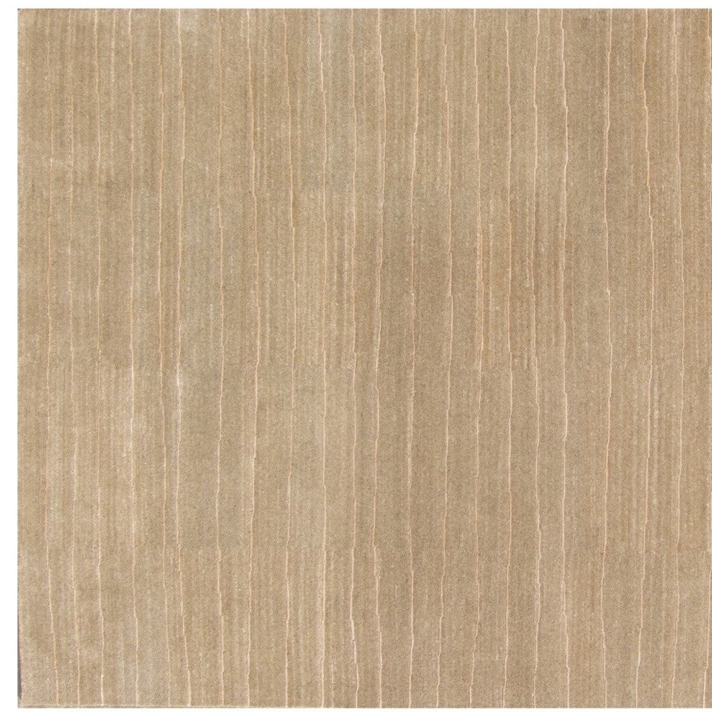 5' X 8' Beige Wool Abstract Hand Loomed Area Rug