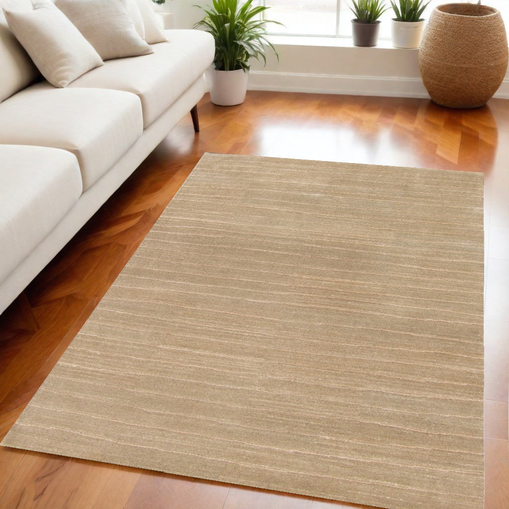 5' X 8' Beige Wool Abstract Hand Loomed Area Rug