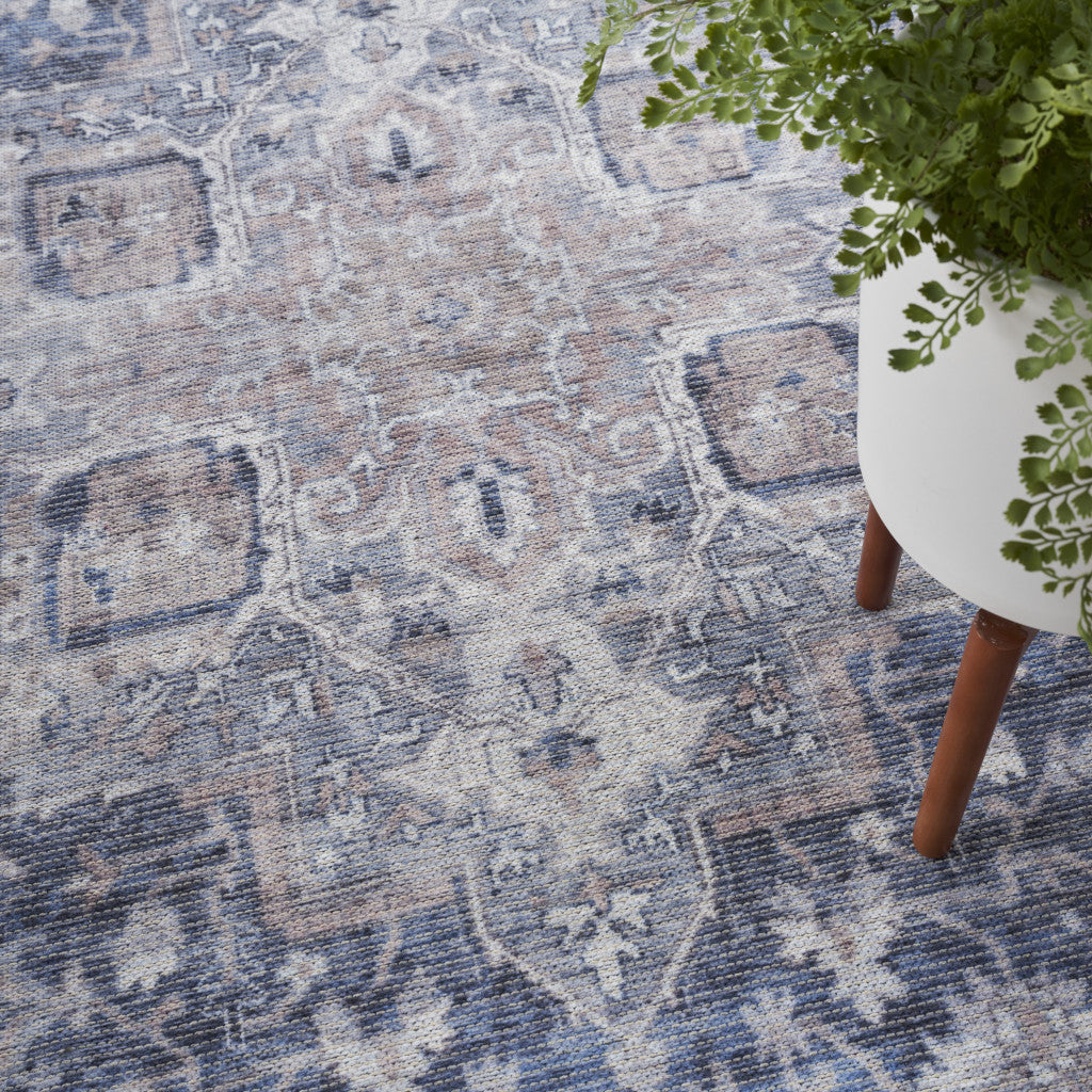 4' X 6' Ivory and Blue Floral Power Loom Distressed Area Rug