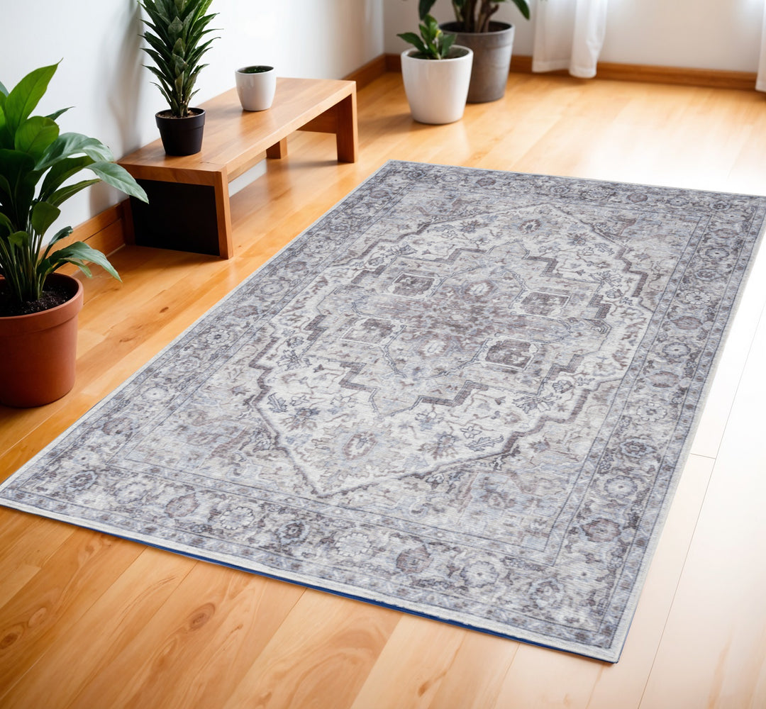 4' X 6' Ivory and Gray Floral Medallion Power Loom Distressed Area Rug