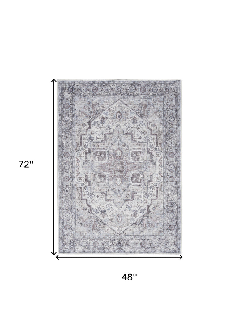 4' X 6' Ivory and Gray Floral Medallion Power Loom Distressed Area Rug