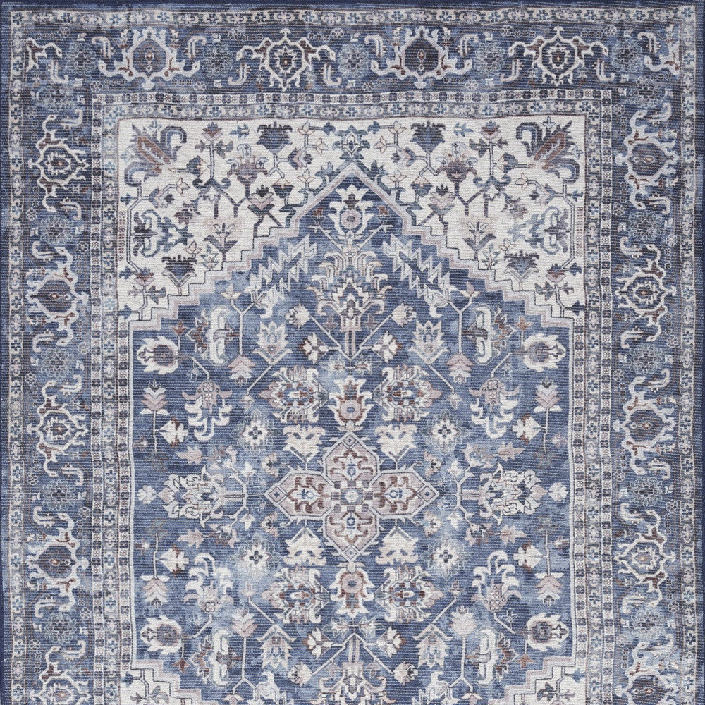 4' X 6' Blue and Ivory Floral Medallion Power Loom Distressed Area Rug