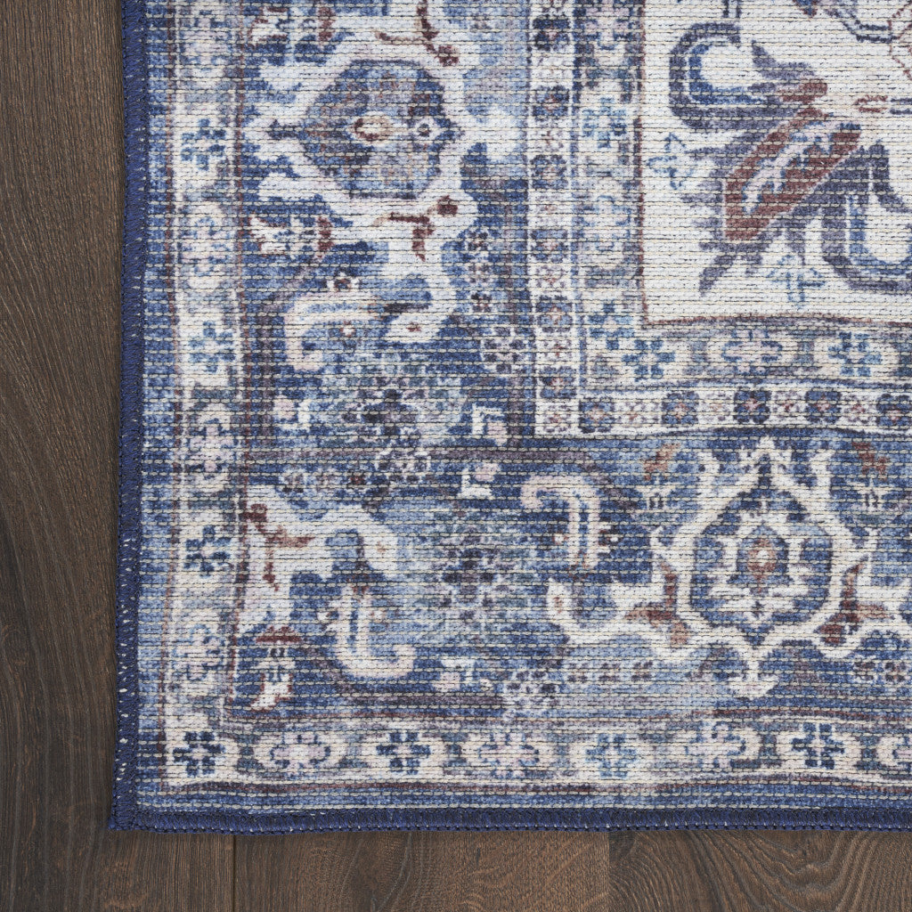 4' X 6' Blue and Ivory Floral Medallion Power Loom Distressed Area Rug