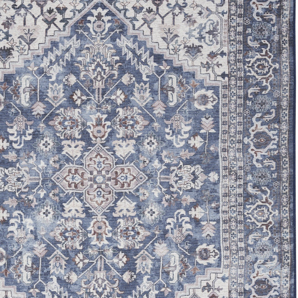 4' X 6' Blue and Ivory Floral Medallion Power Loom Distressed Area Rug