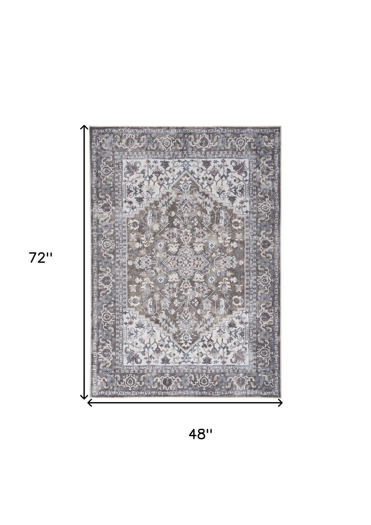 4' X 6' Green and Ivory Floral Medallion Power Loom Distressed Area Rug