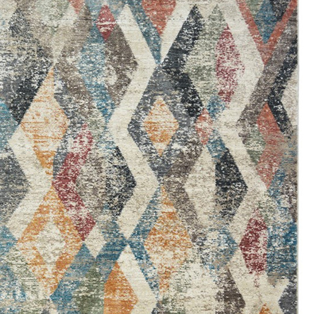 2' X 3' Beige Blue and Gray Geometric Distressed Area Rug With Fringe