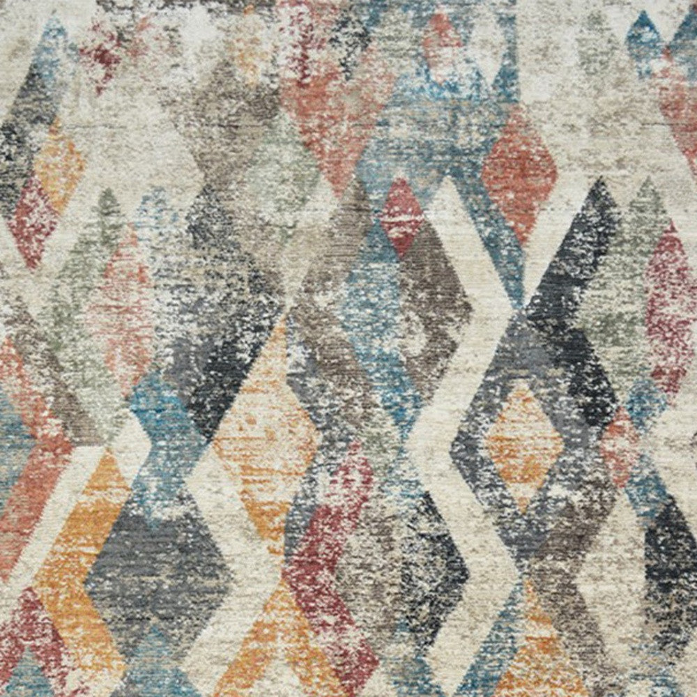 2' X 3' Beige Blue and Gray Geometric Distressed Area Rug With Fringe