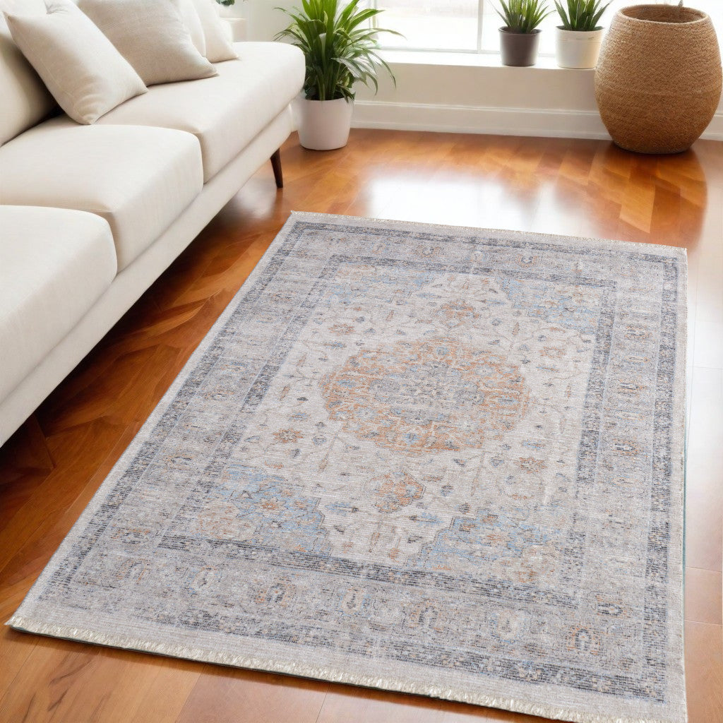 5' X 8' Ivory Blue and Orange Oriental Hand Woven Distressed Area Rug With Fringe