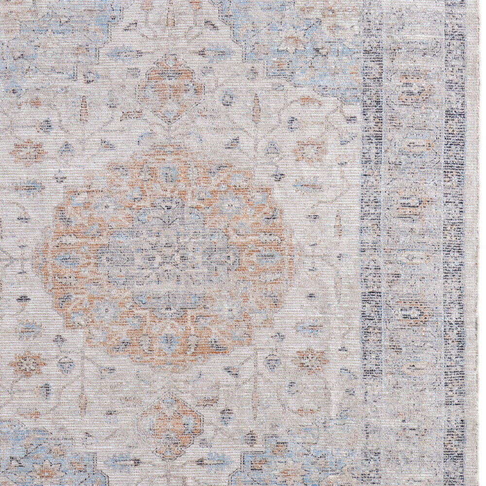 5' X 8' Ivory Blue and Orange Oriental Hand Woven Distressed Area Rug With Fringe