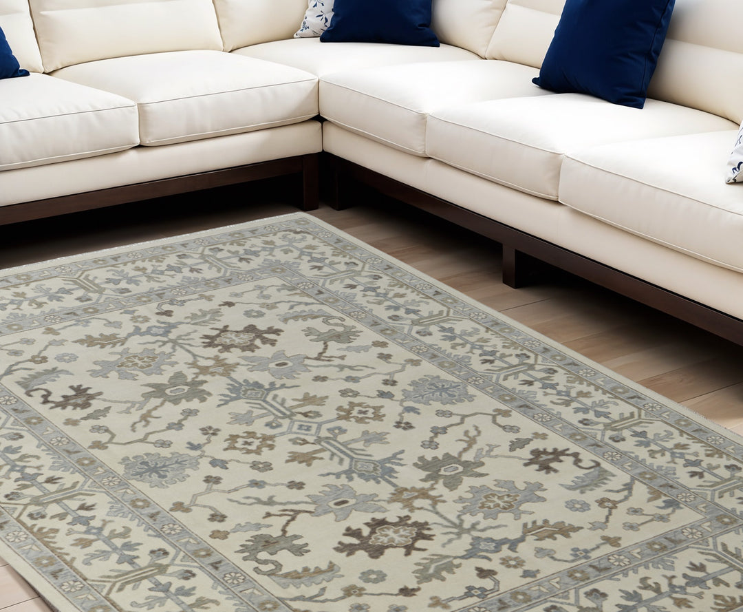 4' X 6' Ivory Gray and Brown Wool Floral Hand Knotted Area Rug With Fringe