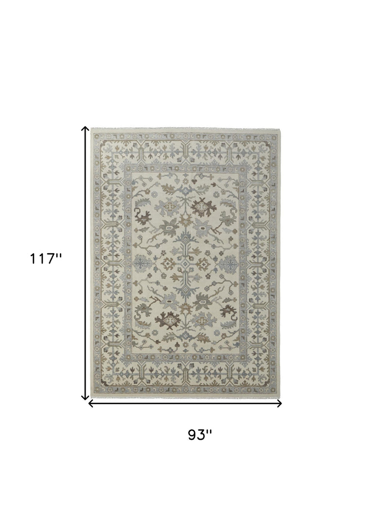 4' X 6' Ivory Gray and Brown Wool Floral Hand Knotted Area Rug With Fringe