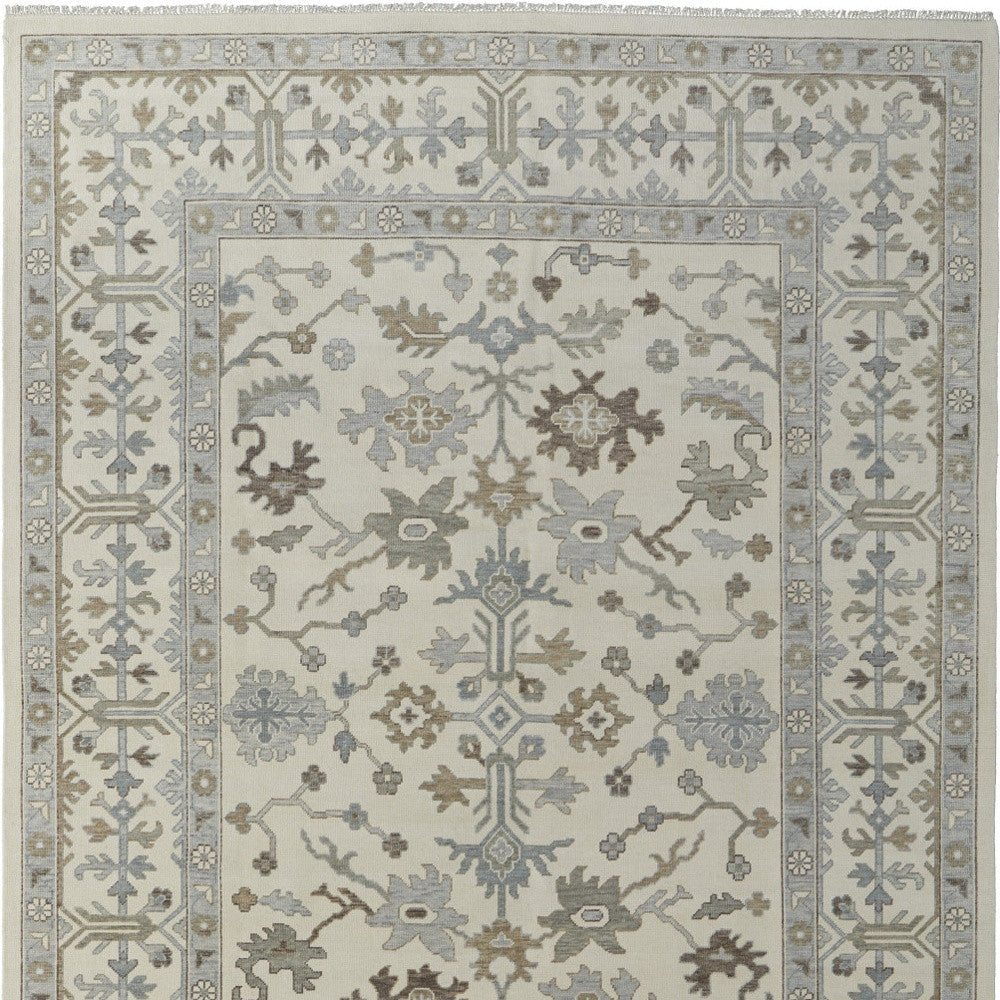 4' X 6' Ivory Gray and Brown Wool Floral Hand Knotted Area Rug With Fringe