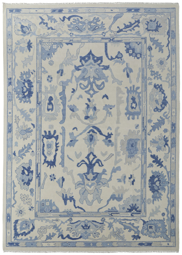 4' X 6' Ivory and Blue Wool Floral Hand Knotted Area Rug With Fringe