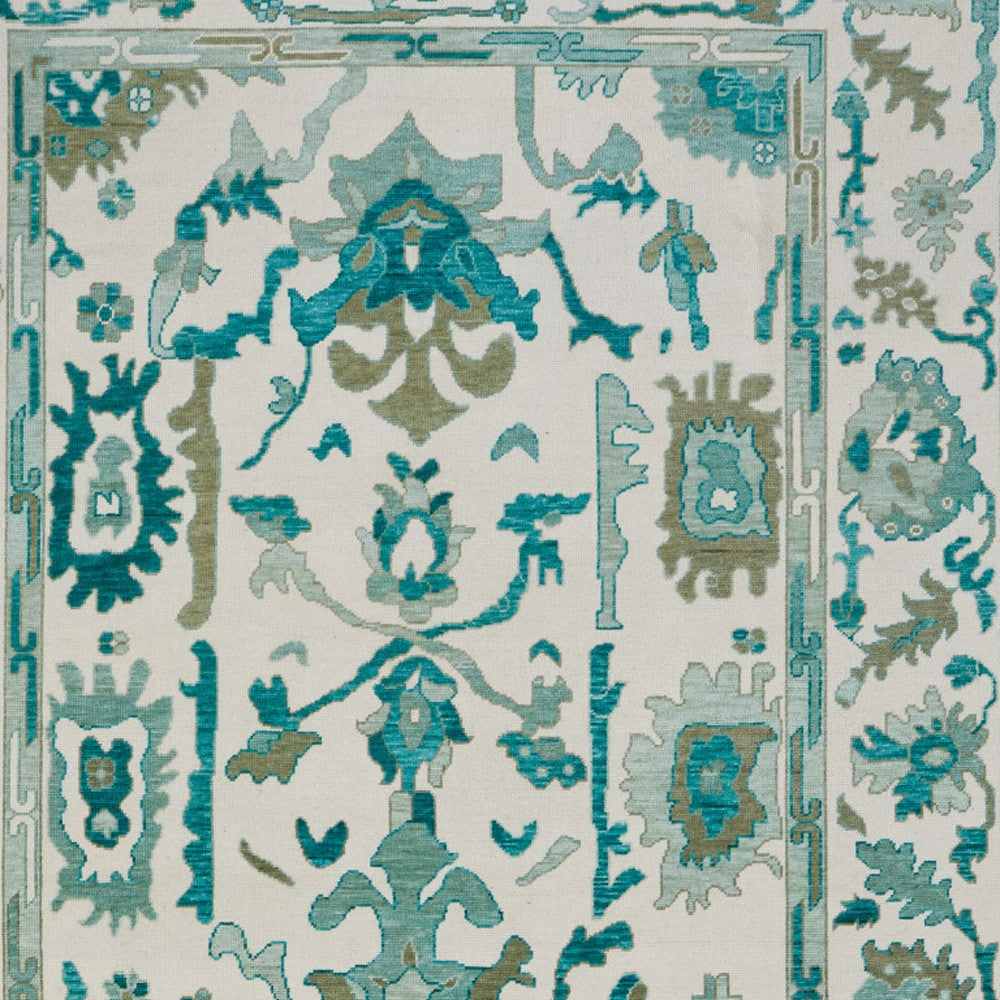 4' X 6' Ivory and Blue Wool Floral Hand Knotted Area Rug With Fringe