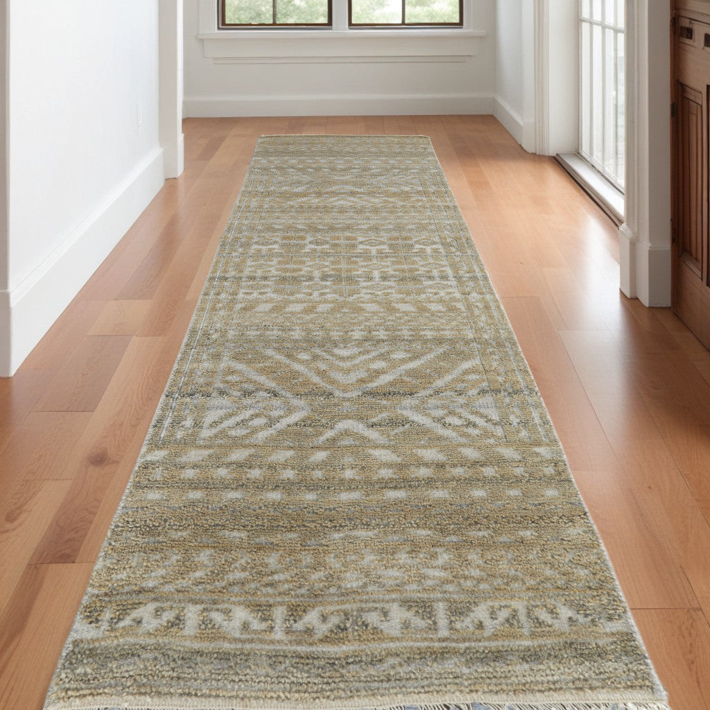 4' X 6' Gold and Tan Geometric Hand Knotted Worn Faded Area Rug