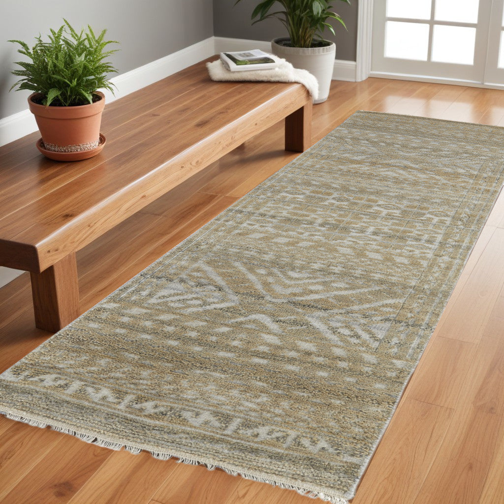 4' X 6' Gold and Tan Geometric Hand Knotted Worn Faded Area Rug