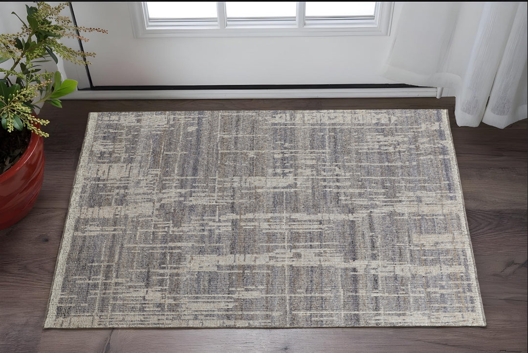 4' X 6' Gray and Ivory Wool Abstract Hand Knotted Worn Faded Area Rug