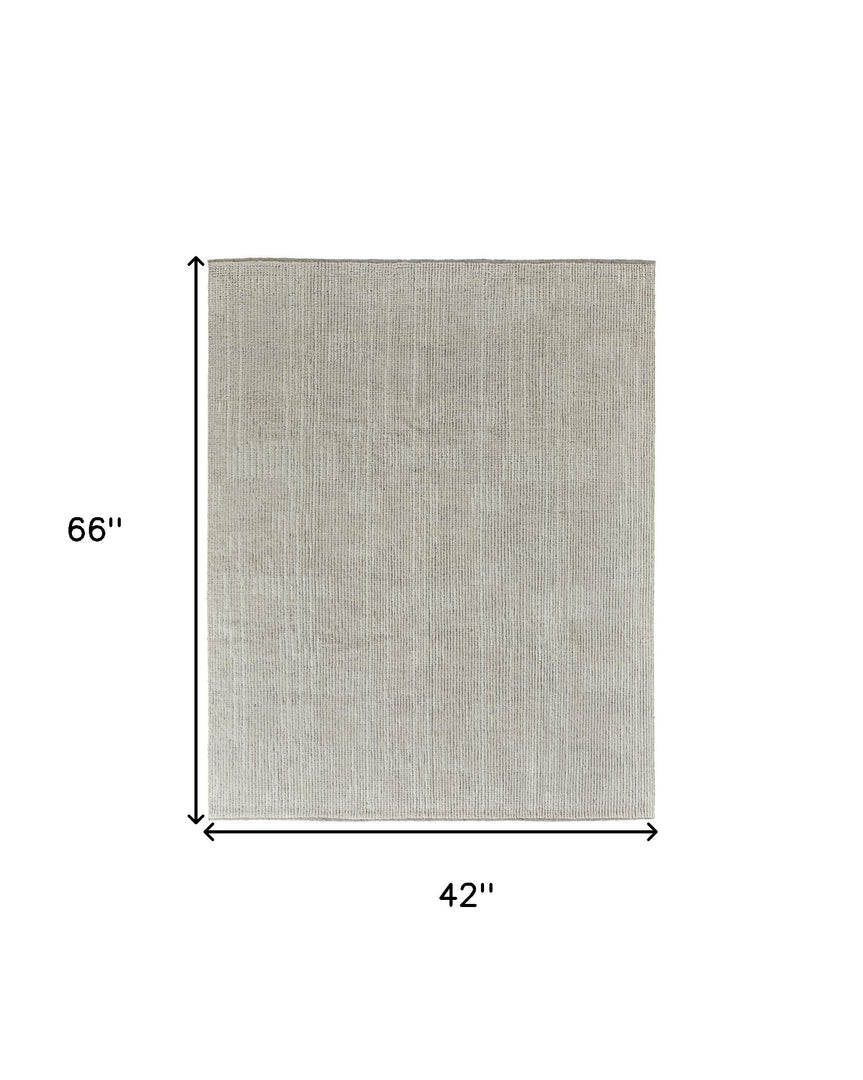 4' X 6' Tan and Ivory Wool Hand Knotted Area Rug